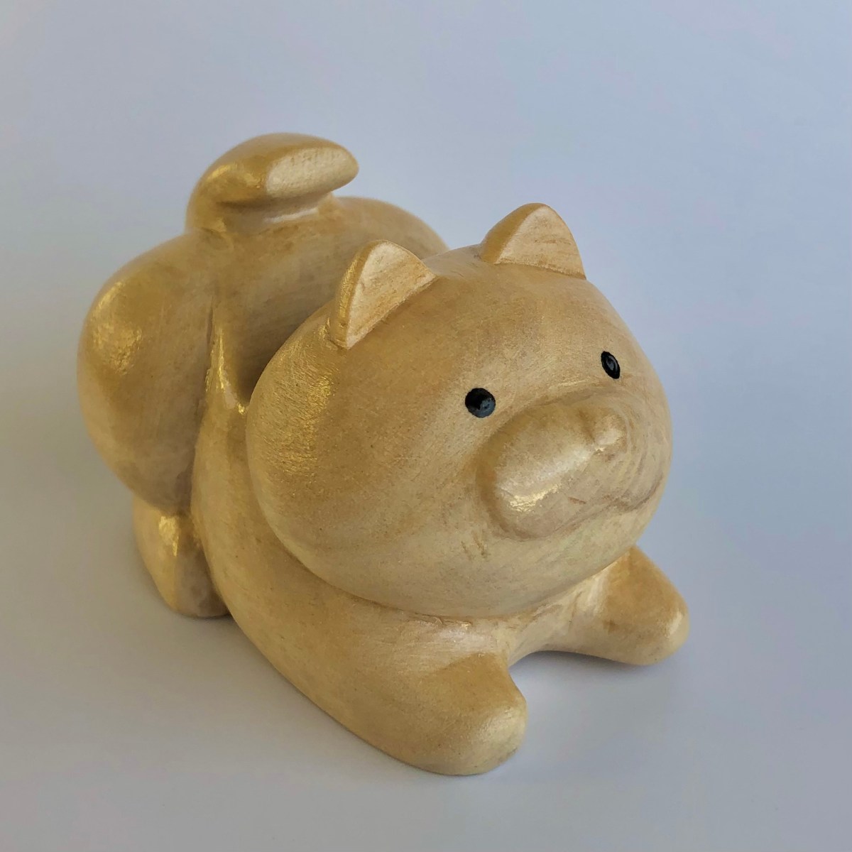 ケータイが置けるネコの置物